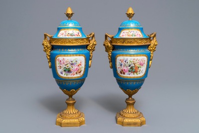 A pair of S&egrave;vres-style 'bleu c&eacute;leste' ormolu-mounted vases and covers, France, 19th C.