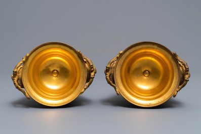 A pair of S&egrave;vres-style 'bleu c&eacute;leste' ormolu-mounted vases and covers, France, 19th C.