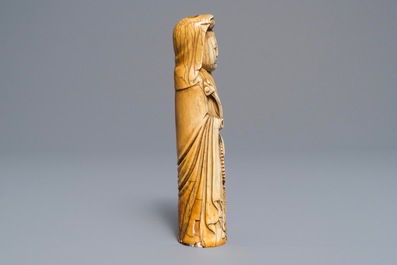 A Chinese carved ivory figure of a lady, Ming