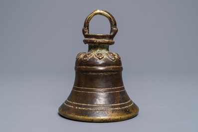 A Sino-Tibetan bronze bell with traces of lacquer and gilding, 17/18th C.