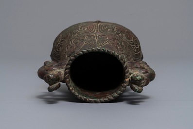 An archaic Chinese relief-decorated two-handled bronze vase, 19th C.