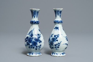 A pair of Dutch Delft blue and white octagonal bottle vases, 17/18th C.
