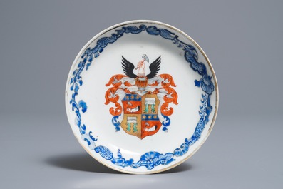 Two Chinese armorial cups and a saucer, Yongzheng