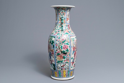 A Chinese famille rose vase with figures in a garden, 19th C.