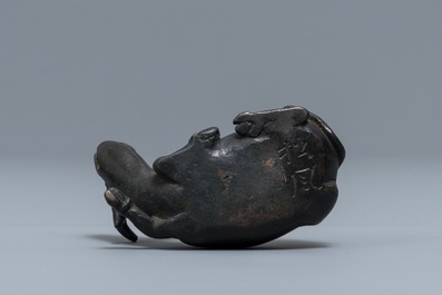 A Chinese bronze water dropper in the shape of a buffalo, two-character mark, Ming