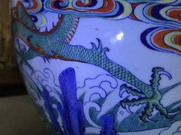 Un vase imp&eacute;rial en porcelaine de Chine doucai &agrave; d&eacute;cor de dragons, marque et &eacute;poque de Qianlong