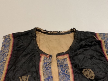 Two Chinese embroidered silk woman&rsquo;s clothes, 19th C.