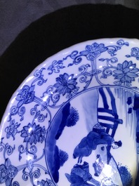 Two Chinese blue and white moulded plates with figures, Kangxi mark and of the period