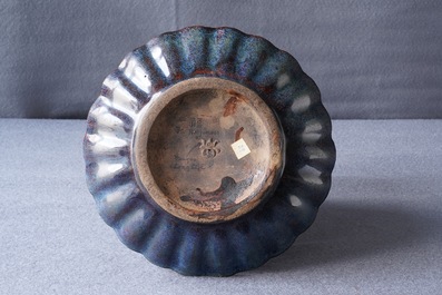 A Chinese Shiwan flamb&eacute;-glazed 'chrysanthemum' dish, impressed mark, 18/19th C.