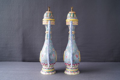 A pair of Chinese Islamic market Canton enamel ewers and covers, Qianlong/Jiaqing