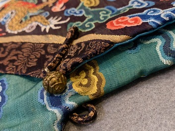 A Chinese embroidered turquoise-ground five-clawed dragon robe, 'jifu', 19th C.