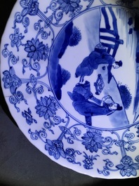 Two Chinese blue and white moulded plates with figures, Kangxi mark and of the period