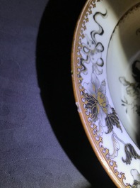 A pair of Chinese capucin-ground grisaille and gilt armorial plates, Qianlong