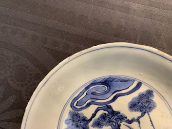 A pair of Chinese blue and white 'Three friends of winter' plates, Chenghua mark, Wanli