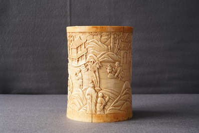 A Chinese carved ivory 'Seven Sages of the Bamboo Grove' brush pot, 18th C.