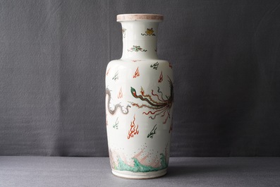 A Chinese famille verte inscribed 'dragon and phoenix' rouleau vase, Kangxi mark and of the period