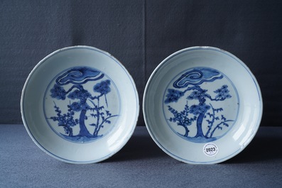 A pair of Chinese blue and white 'Three friends of winter' plates, Chenghua mark, Wanli