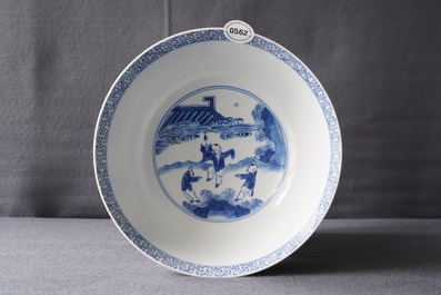 A Chinese blue and white bowl with floral and narrative panels, Kangxi mark and of the period