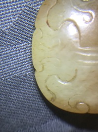 A Chinese russet jade 'Tiger Charm' inscribed pendant, 19/20th C.