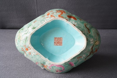 A Chinese imperial quatrefoil 'dragons' dish on foot, Jiaqing mark and of the period