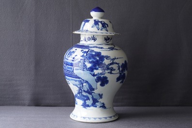 A Chinese blue and white vase and cover with ladies in a garden, 19th C.