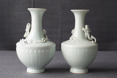 A pair of Chinese ru-style glazed vases with applied qilong, Yongle mark, 19th C.