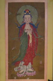 Chinese school: The goddess Guanyin standing, ink and colour on paper, 18/19th C.