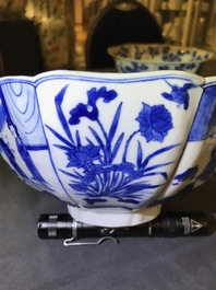 A Chinese blue and white bowl with figurative and floral panels, Chenghua mark, Kangxi