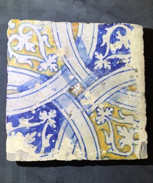 Three ornamental Antwerp maiolica tiles, 16th C.