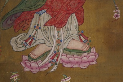 Chinese school: The goddess Guanyin standing, ink and colour on paper, 18/19th C.