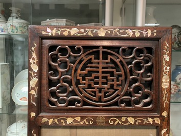 A Chinese mother-of-pearl inlaid wooden screen with silk paintings, 19th C.