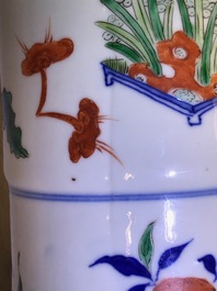 A pair of Chinese wucai gu vases, 19th C.