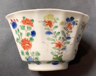 A pair of lobed Chinese famille verte cups and saucers, Kangxi