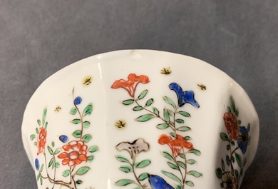 A pair of lobed Chinese famille verte cups and saucers, Kangxi