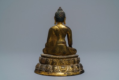 A gilt bronze figure of Buddha Shakyamuni, Tibet, 14/15th C.