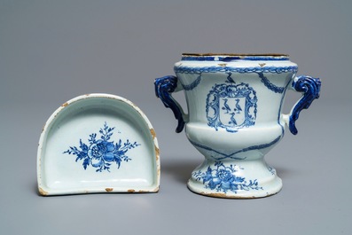 A Dutch Delft blue and white armorial 'campana' vase on stand, 18th C.