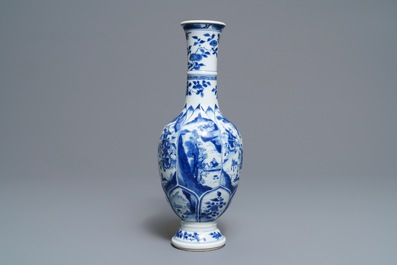 A Chinese blue and white bottle vase with horseriders and landscapes, Kangxi