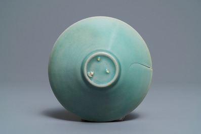 A Korean conical celadon bowl with underglaze floral design, Goryeo or later