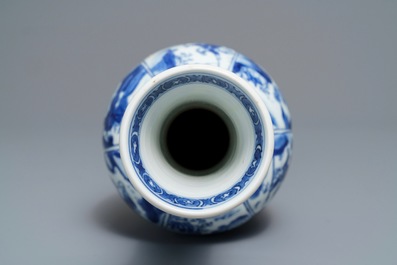 A Chinese blue and white bottle vase with horseriders and landscapes, Kangxi