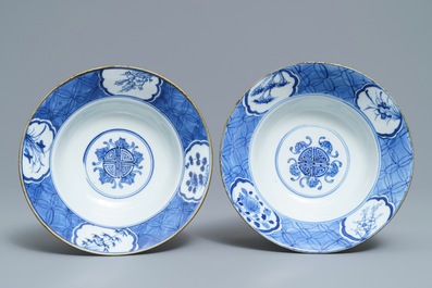 A pair of Chinese blue and white bowls, poss. for the Vietnamese market, Kangxi mark, 19th C.