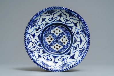 A large blue and white fritware spittoon or strainer, Qajar, Iran, 19th C.