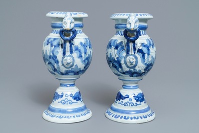 A pair of Dutch Delft blue and white chinoiserie altar vases, 17th C.
