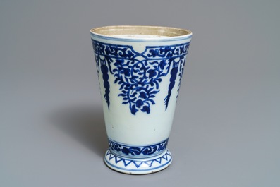 A Chinese blue and white beaker after a European silver model, Kangxi