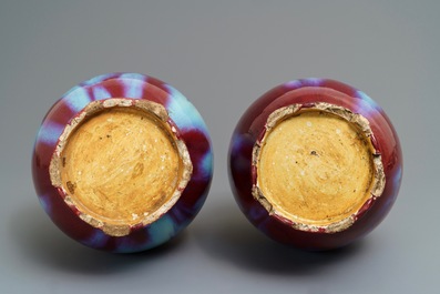 A pair of fine Chinese sang de boeuf and flamb&eacute;-glazed vases, 19/20th C.