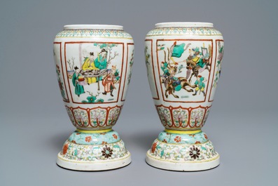 A pair of Chinese famille verte urns, 19th C.