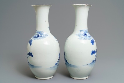 A pair of Chinese blue and white bottle vases, Kangxi mark, 19th C.