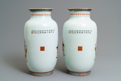 A pair of Chinese iron red, grisaille and gilt vases, Qianlong mark, 20th C.