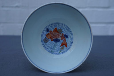 A Chinese doucai bowl with fish in a lotus pond, Xuande mark, Kangxi