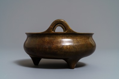 A Chinese bronze tripod censer, Xuande mark, 19th C.