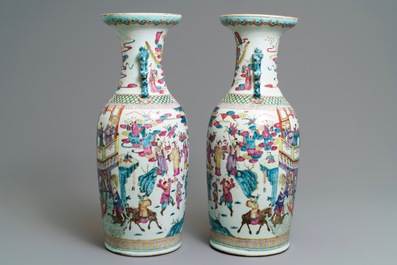A pair of Chinese famille rose 'immortals' vases, 19th C.